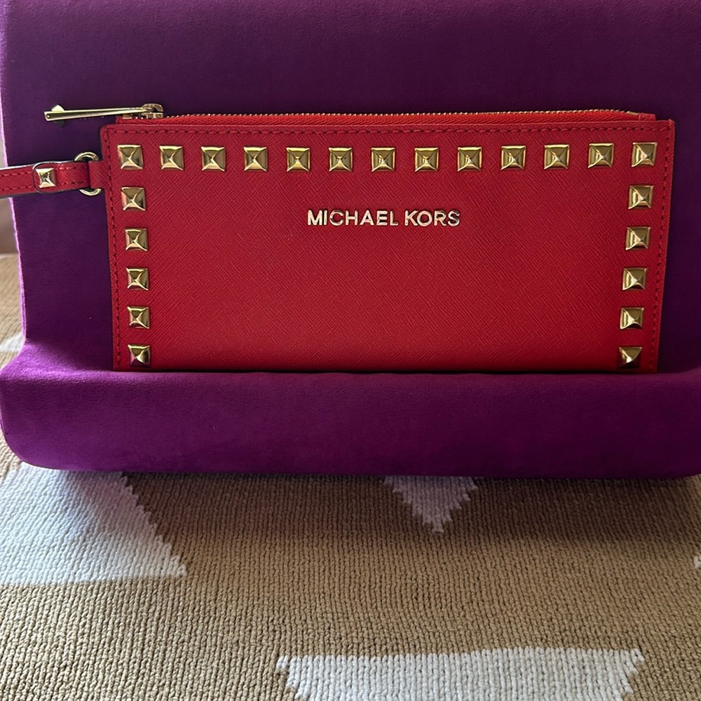 Michael Kors Studded Leather Mini Wristlet Clutch Orange color